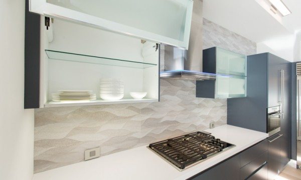 Vertically opening wall cabinets from the Aran Cucine Volare collection are as functional as they are beautiful.