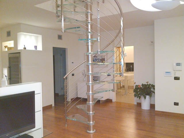 Spiral stairs, spiral staircases, curved staircases, curved stairs, custom made staircases, custom staircases from Italy, wood steps, glass steps, wooden stairs