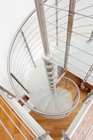 Spiral stairs, spiral staircases, curved staircases, curved stairs, custom made staircases, custom staircases from Italy, wood steps, glass steps, wooden stairs