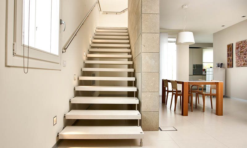 Modern staircases, spiral stairs, curved staircases with wood, glass, or steel steps and railings custom designed and installed by our professional team.