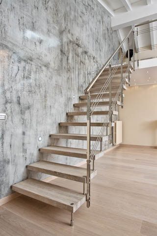 Modern staircases, spiral stairs, curved staircases with wood, glass, or steel steps and railings custom designed and installed by our professional team.