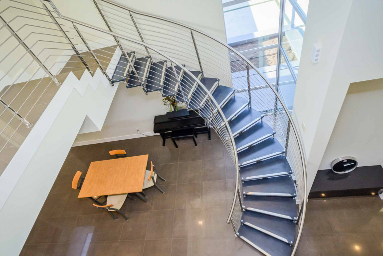 Custom Curved Staircase a Grand Solution for Modern Home