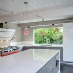 Renovations to Eichler kitchens require a strict attention to the integrity of the design. This Eichler in Sunnyvale uses cabinets from the Aran Cucine Penelope collection in Ash Larch, with white glossy cabinets from the Doga collection. The countertop is Silestone in White Storm, with a sink and faucet from Blanco. The refrigerator and freezer are from Liebherr, BlueStar range and FuturoFuturo hood, with a dishwasher, oven, and steam oven from Miele. In the bathrooms we used vanities from GB Group’s Sahara collection.