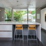 Renovations to Eichler kitchens require a strict attention to the integrity of the design. This Eichler in Sunnyvale uses cabinets from the Aran Cucine Penelope collection in Ash Larch, with white glossy cabinets from the Doga collection. The countertop is Silestone in White Storm, with a sink and faucet from Blanco. The refrigerator and freezer are from Liebherr, BlueStar range and FuturoFuturo hood, with a dishwasher, oven, and steam oven from Miele. In the bathrooms we used vanities from GB Group’s Sahara collection.