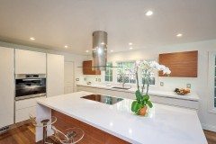 White Kitchen with Waterfall Countertop