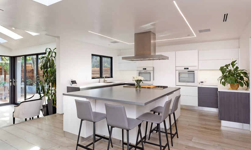 Susan Bowen and Revital Kaufman-Meron of BeKom Design prefer LED strips to recessed cans. Cabinets pictured by European Cabinets & Design Studios. Photo: Rich Andersen/LucidPic.